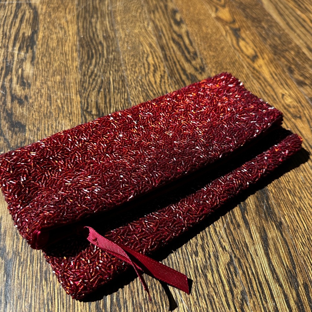 Beautiful red beaded fold over clutch